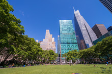 Bryant Park On A Wonderful Spring Day. Tourists Relaxing On The