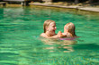 © Joshhh - Young mother and daughter swimming in crystal clear laguna on tr