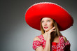 © Elnur - Woman wearing nice red sombrero