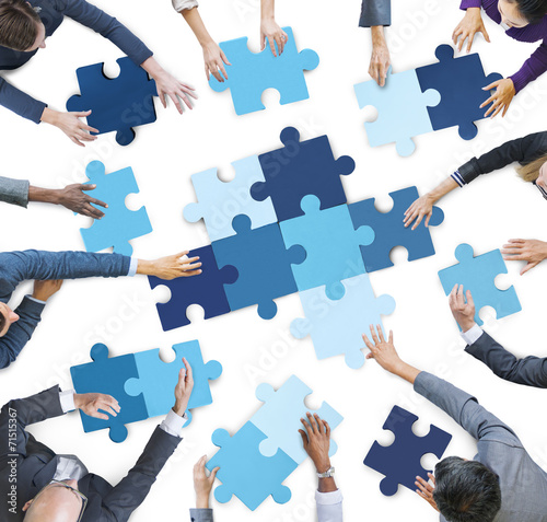 Fotografia Business People Piecing Puzzle Pieces