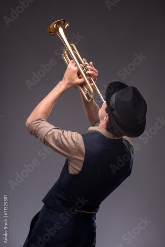 Fototapeta do kuchni Handsome young jazz man