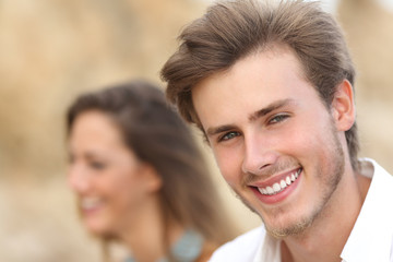 handsome man portrait with a perfect white tooth and smile