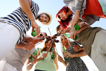 Wall Mural - Young friends on rest, outdoors