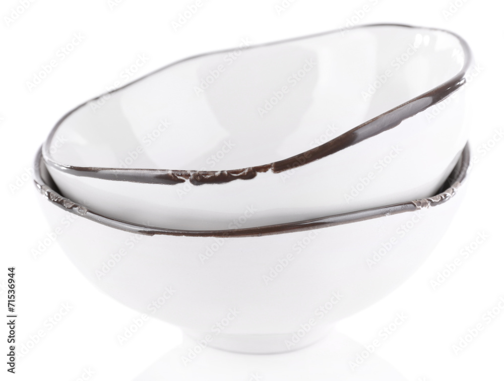 White ceramic bowls isolated on white