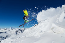 Alpine Skier Jumping From Hill