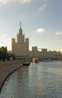 Moscow city center highrise tower on the sunrise and yacht saili