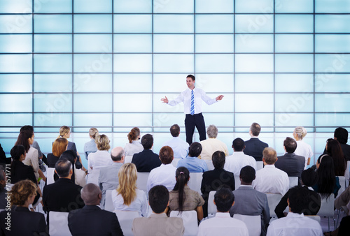 Fotografie, Obraz Businessman giving Presentation to his Colleagues