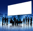 © Rawpixel.com - Silhouettes Group of Business People Meeting with Billboard