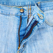 Opened denim jeans fly fragment