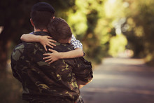 Woman And Soldier In A Military Uniform Say Goodbye