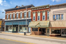 Ornate Downtown Shops And Storefronts On Main Street In Midwest Small Town