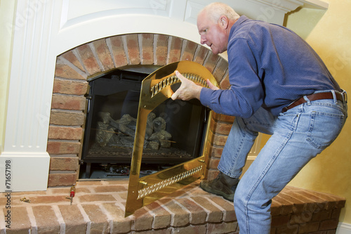 Gas Fireplace Repair Buy This Stock Photo And Explore Similar