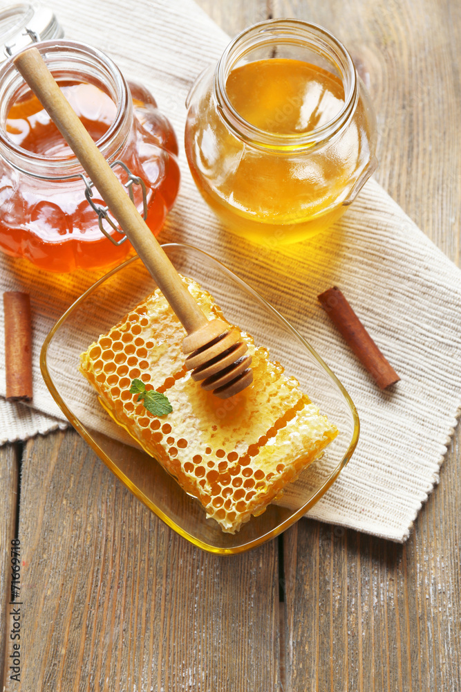 Fresh honey on wooden table