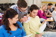 © Syda Productions - group of smiling students in lecture hall