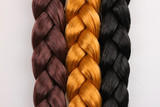Brown,blonde and black hair braid