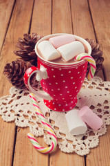 Wall Mural - Hot chocolate and marshmallows in red polka dots cup