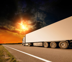 Canvas Print - Truck on asphalt road motion blur