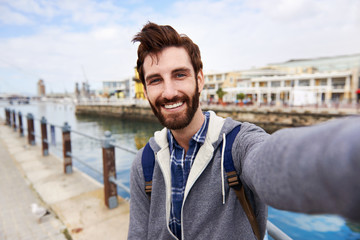 smiling selfie tourist