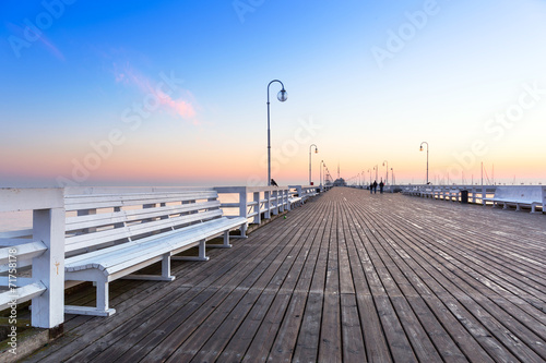 Nowoczesny obraz na płótnie Sunrise at wooden pier in Sopot over Baltic sea, Poland