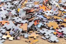 Heap Of Jigsaw Puzzle Pieces