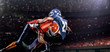 © 103tnn - American football player in action at game time