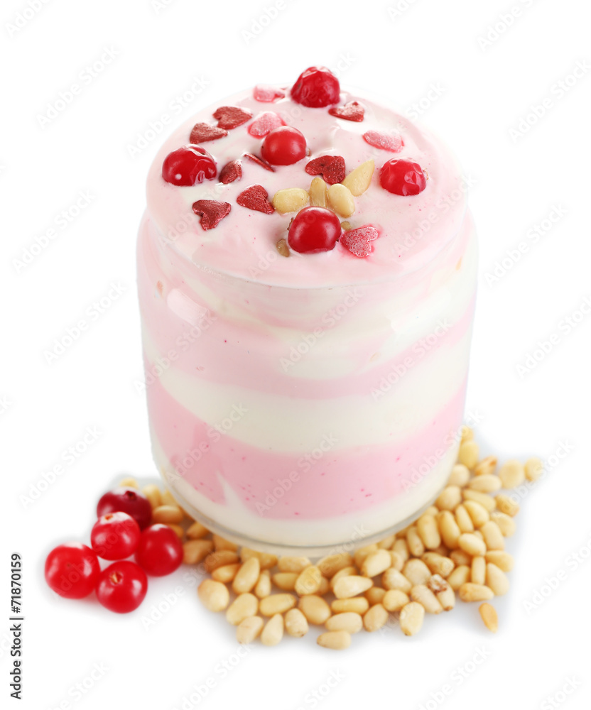 Cranberry milk dessert in glass jar, isolated on white
