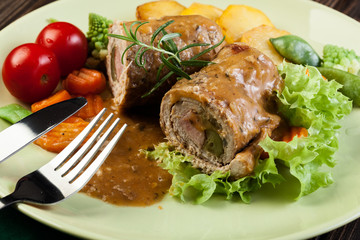 Canvas Print - Pork rolls with prepared potatoes and vegetables