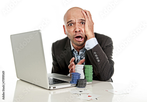 internet gambling addict businessman in stress betting poker Poster