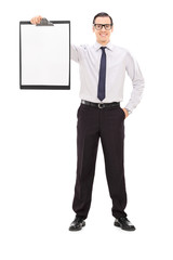 Poster - Young businessman holding a clipboard