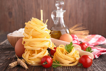 Wall Mural - raw italian pasta and ingredient