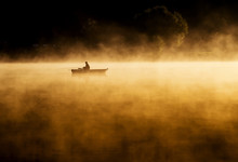 Early Morning Sunrise, Boating On The Lake In A Huge Fog