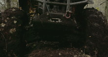 The Muddy 4x4 Offroad Vehicle Stuck In The Muddy Forest