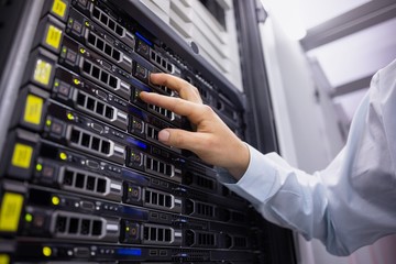 Poster - Technician working on server tower