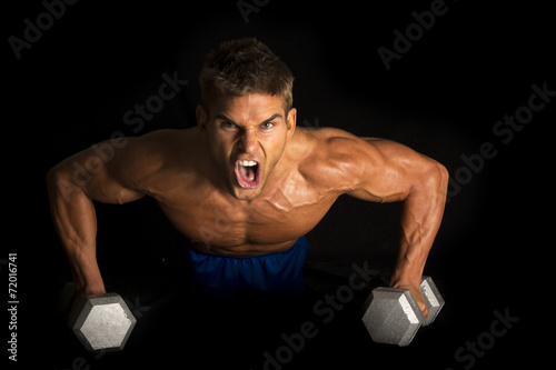Fotografie, Obraz man fitness no shirt on black pushup mean