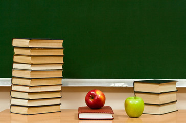 closed book and two apples