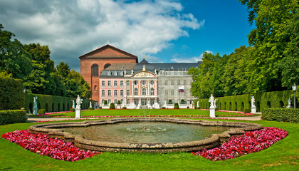 Electorate Palace and its garden with flowers in Trier, Germany