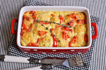 Wall Mural - Vegetables with cheese crust in a ceramic baking dish