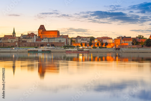 Naklejka na szybę Torun old town reflected in Vistula river at sunset, Poland