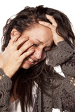 Fototapeta Kosmos - Depressive messy and crying woman on white background