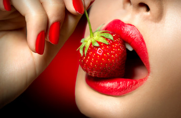 Poster - Sexy Woman Eating Strawberry. Sensual Red Lips