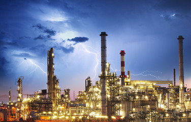 Wall Mural - Oil indutry refinery - factory with lightning