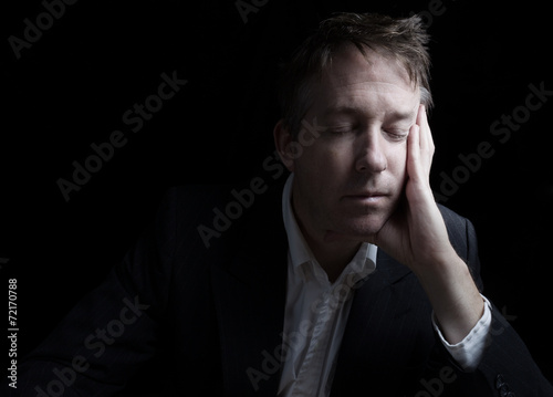 Fotografie, Obraz Unemployed depressed man resting his eyes