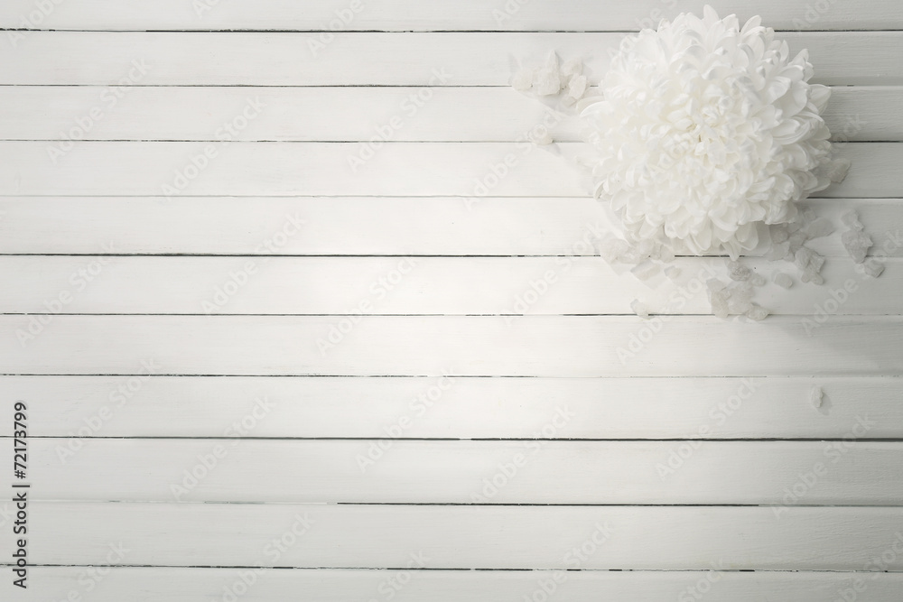 Beautiful flowers on wooden background