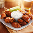 boneless buffalo bbq chicken wngs with ranch sauce and beer