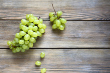 Bunch Green Grapes On Wooden Background