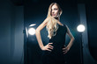 © julenochek - Beautiful woman posing at studio in light flashes