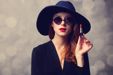 Sticker - Style redhead women with sunglasses and lipstick.