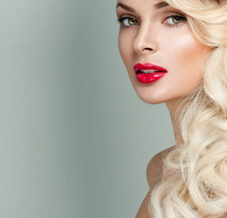 Wall Mural - beautiful blonde  woman with bright red lipstick