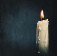 Burning Candle Over Black. Is Not Isolated, Just Shot On Black