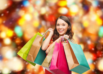 Sticker - smiling woman with colorful shopping bags